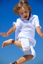 Boy jumping midair