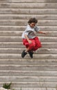 Boy jumping off building Royalty Free Stock Photo