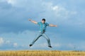 Boy jumping, running against blue sky Royalty Free Stock Photo