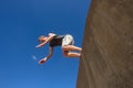 Boy Jumping Somersault Blue Parkour Royalty Free Stock Photo