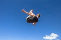 Boy Jumping Somersault Blue Parkour Royalty Free Stock Photo