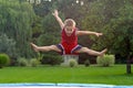 Boy Jumping on trampoline Royalty Free Stock Photo