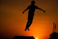 Boy jumping on a trampoline