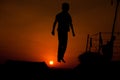 Boy jumping on a trampoline