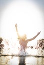 Boy jumping up in lake Royalty Free Stock Photo