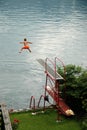 Boy jumps into the lake Royalty Free Stock Photo