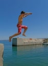 Boy jumping in sea Royalty Free Stock Photo
