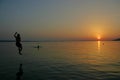 Boy jumps into the sea Starigrad-Paklenica seaside sunset Royalty Free Stock Photo