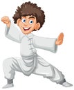 A boy in karate pose wearing white gi