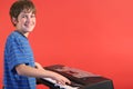 Boy on keyboard left Royalty Free Stock Photo