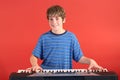 Boy on keyboard straight Royalty Free Stock Photo