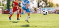 Boy Kick Soccer Ball Towards Goal and Try to Score a Goal. Kids Playing Football Ball on Grass Field Royalty Free Stock Photo