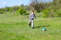 Boy Kicking Colorful Soccer Ball in Field Royalty Free Stock Photo