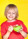 Boy kid child eating corn flakes cereal Royalty Free Stock Photo