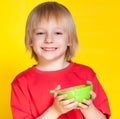 Boy kid child eating corn flakes cereal Royalty Free Stock Photo