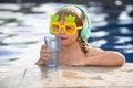 Boy kid happy swimming in a pool. Summer child.