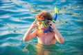 Boy kid playing on the beach on summer holidays. Child in nature with beautiful sea, sand and blue sky. Happy kids on Royalty Free Stock Photo