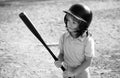 Boy kid posing with a baseball bat. Portrait of child playing baseball. Royalty Free Stock Photo