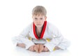 Boy in a kimono sits on a floor Royalty Free Stock Photo