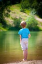 Boy on lakeside