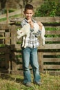 Boy with lamb on the farm