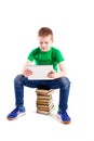 Boy with laptop and books Royalty Free Stock Photo