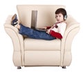Boy with laptop and headphone. Royalty Free Stock Photo