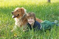 Boy Laying Down with Dog Royalty Free Stock Photo