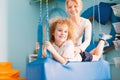 Boy laying on therapy swing Royalty Free Stock Photo