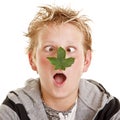 Boy with leaf on his nose