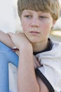 Boy Leaning on Railing Royalty Free Stock Photo