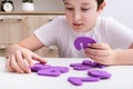 A boy learning math, count exercises at home Royalty Free Stock Photo