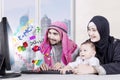 Boy learning math on screen with parents Royalty Free Stock Photo