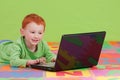 Boy learning with notebook computer