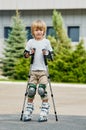 Boy learning rollerblading Royalty Free Stock Photo