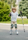 Boy learning rollerblading Royalty Free Stock Photo