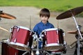 Boy learning to drum