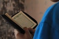 Boy Learning to Read Quran in Arabic Royalty Free Stock Photo