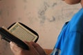 Boy Learning to Read Quran in Arabic Royalty Free Stock Photo