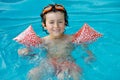 Boy learning to swim Royalty Free Stock Photo