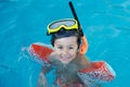 Boy learning to swim Royalty Free Stock Photo