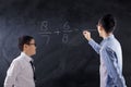 Boy learns math lesson in class
