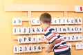 Boy and letters Royalty Free Stock Photo