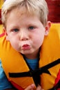 Boy in a life jacket Royalty Free Stock Photo