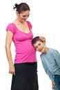 Boy listen to his mother pregnant tummy