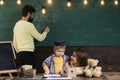 Boy listening to mom with attention. Homeschooling concept. Family cares about education of their little smart son