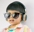 Boy is listening to Music on headphone Royalty Free Stock Photo
