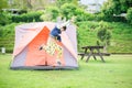 boy living inside the tent in the park Royalty Free Stock Photo