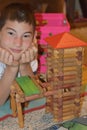 Boy with Log Tower