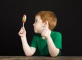 boy with a Lollipop made of sugar Royalty Free Stock Photo